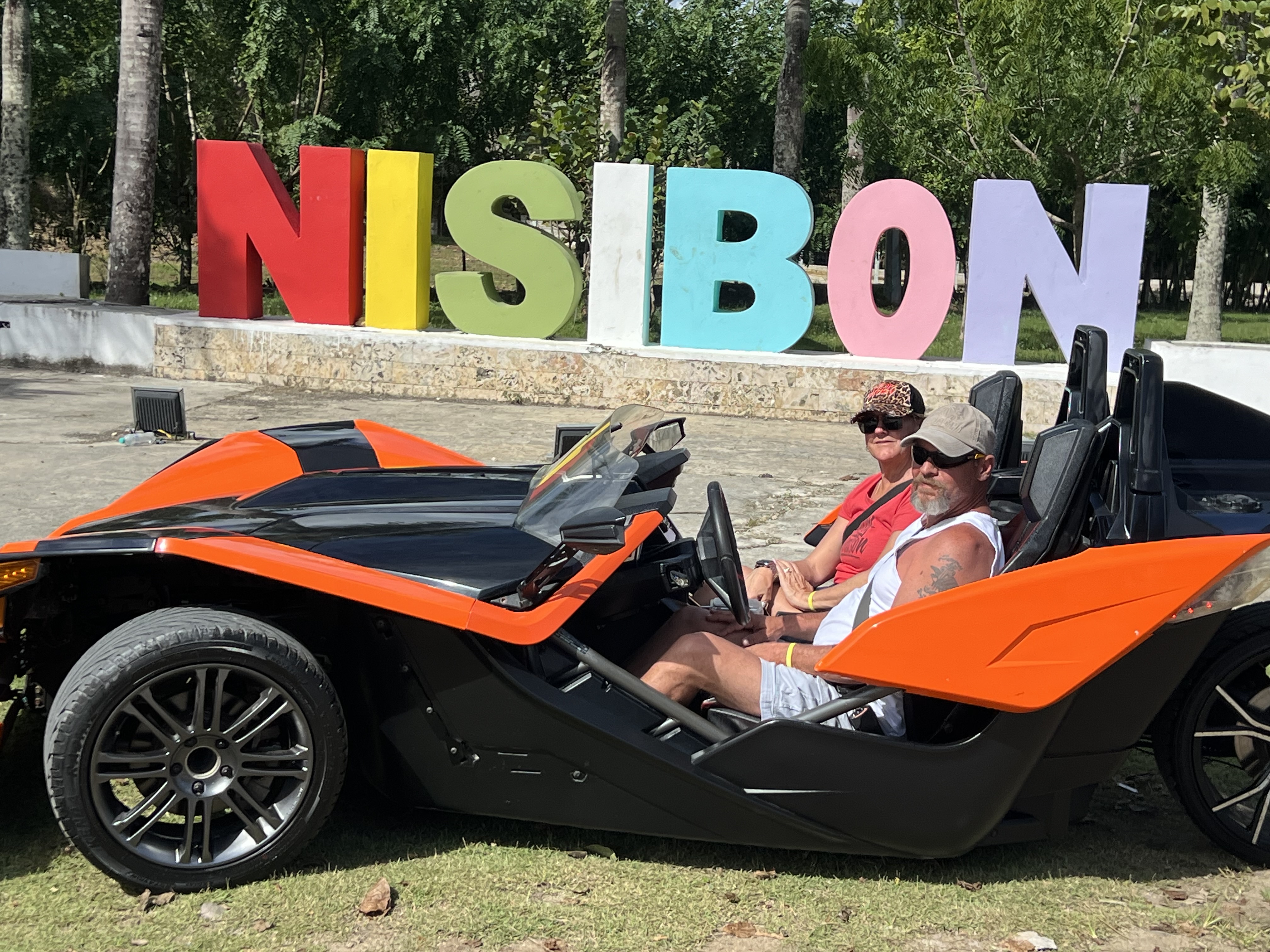 Punta Cana Slingshot Tour driving through Nisibon back roads Nisibon sing picture